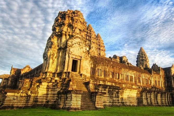 1 day special Tour: Angkor Wat,Bayon,Ta Prohm, Bantey srei and Beng Mealea - Ta Prohm: the shaded walk and the roots that steal the show