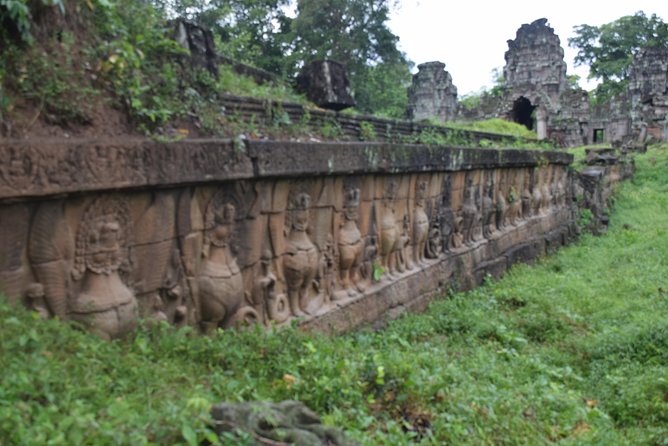 2-D Angkor temple tour with one sunrise in A/C vehicle and guide. - Terrace of the Elephant and Terrace of the Leper King, with private group time