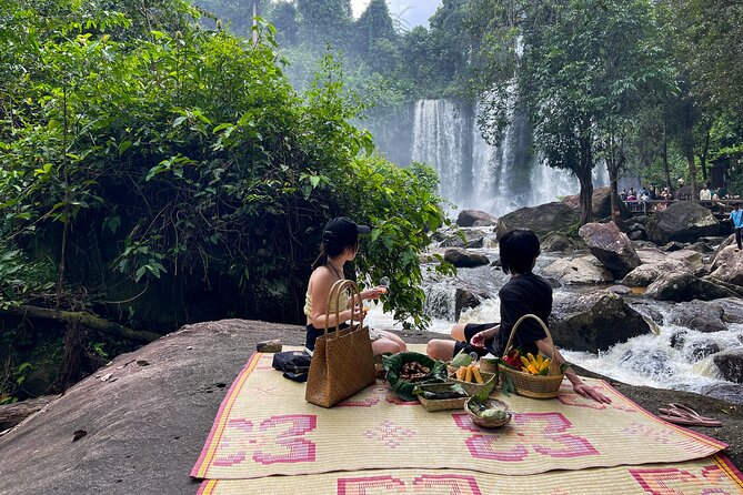 2 Day Angkor Wat Kulen Mountain Beng Mealea Floating Village Tour - Ta Prohm jungle texture, then Angkor Thom with Bayon faces
