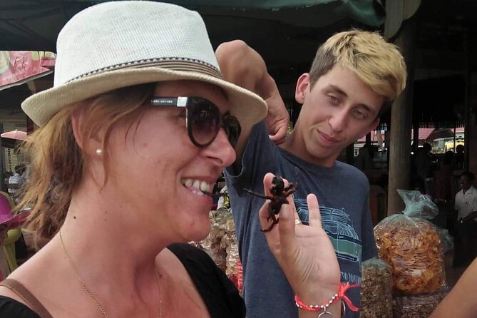 A day Trip Sightseeing Phnom Penh - Siem Reap - Private English Speaking Driver - Stop 1: Skoun Market, Spider Ville for the spicy food courage test