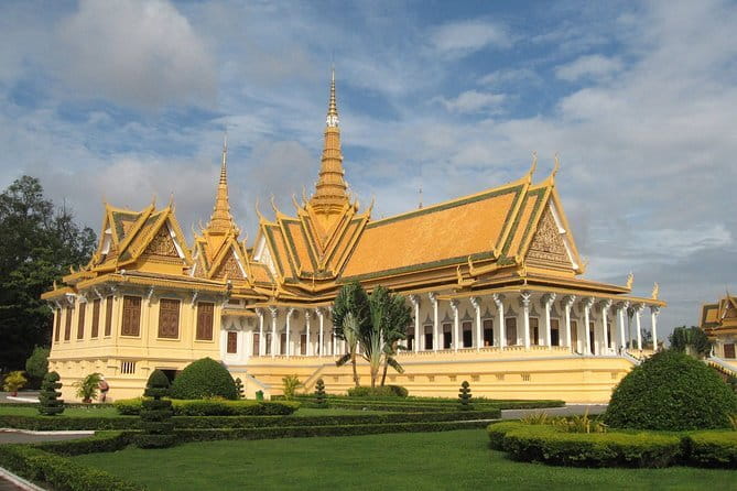 A Day Trip to Angkor Wat, Bayon, Taprohm from Phnom Penh - Bayon: the Buddha faces and the bas-relief focus
