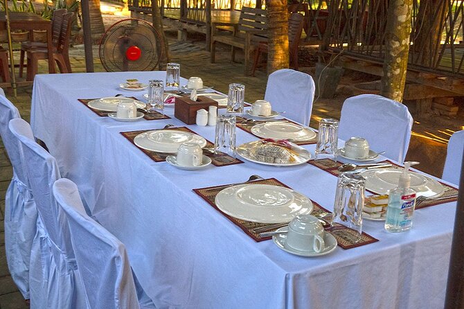 Angkor Sunrise Bike Tour - Breakfast & Lunch included - Angkor Thom south gate, Bayon smiles, and Ta Prohm’s tree canopy
