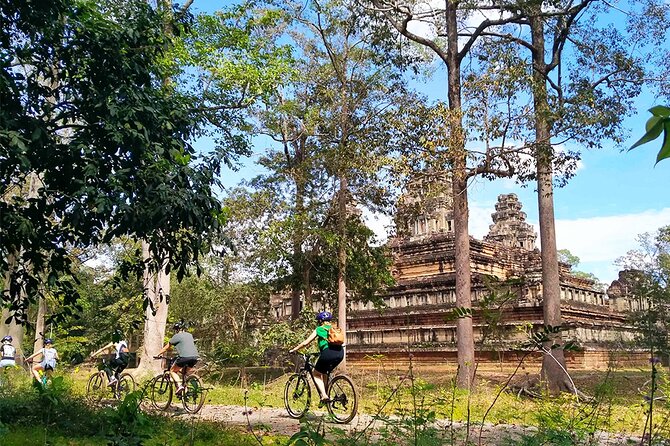 Angkor Sunrise Bike Tour - Breakfast & Lunch included - Entering Angkor Wat at dawn, then moving on fast