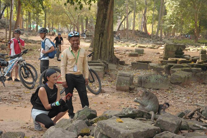 Angkor Sunrise Bike Tour with Lunch Included - Angkor Wat at sunrise: ponds, reflections, and the photo advantage