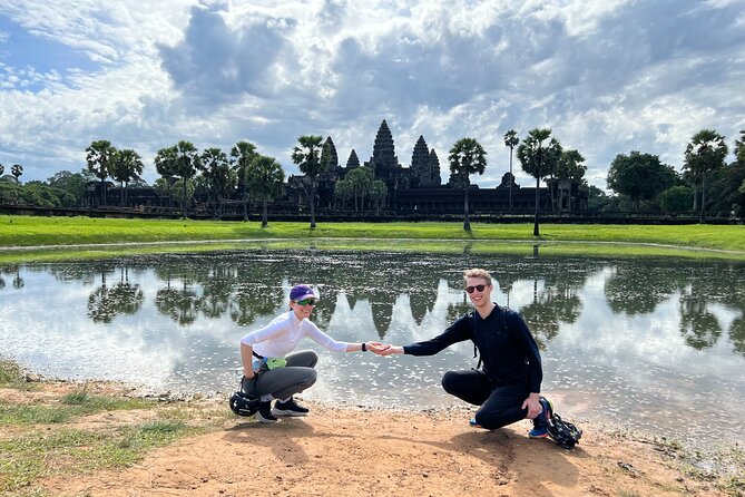 Angkor Sunrise Bike Tour with Lunch Included - Ta Prohm with giant trees: avoiding crowds and riding with the right pace