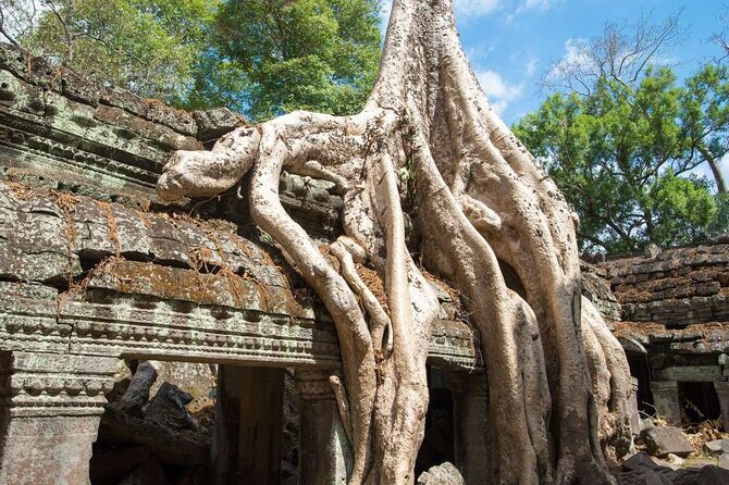 Angkor Thom Ta Prohm and Sunset in Angkor Wat Golden Hour Tour - Angkor Wat Golden Hour: West Gate entry, outer walls, and reflection pool photos