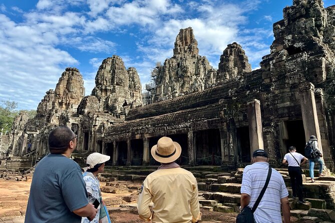 Angkor Wat 1-Day Tour by Private Car or Minivan - Entering the Angkor Wat complex with an English guide