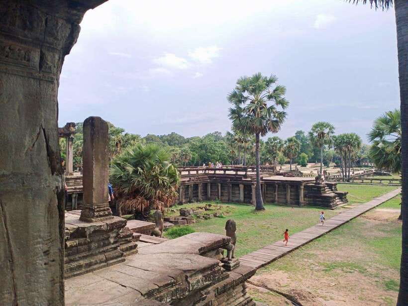 Angkor Wat, Angkor Thom, and Ta Prohm Day Trip with Sunset - Morning Pickup to Angkor Thom South Gate: Where the Faces Start Watching You