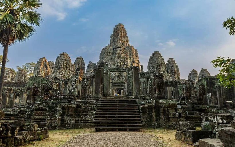 Angkor Wat: Full-Day Guided Sunset Tour - Bayon Temple: Buddhist architecture and the stone faces