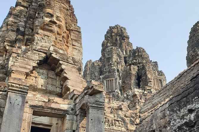 Angkor Wat Full Day Tour in Siem Reap Small-Group - Bayon Temple: compact, face-filled, and easy to navigate