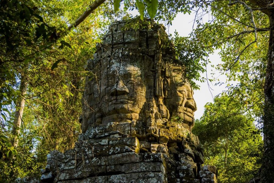 Angkor Wat in a vintage Jeep with driver - jeep rental - Bayon at Angkor Thom: the climb and the face carvings