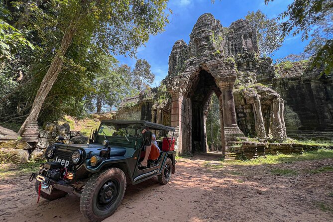 Angkor Wat Sunrise and Market Tour by Jeep - Angkor Thom: Bayon, Baphoun, Phimeanakas, and the Ghost Gate
