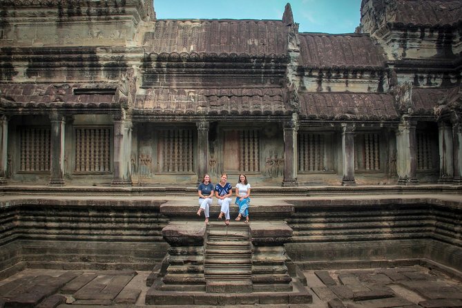 Angkor Wat Sunrise Experience with Breakfast - Angkor Thom Victory Gate photos, then back toward town