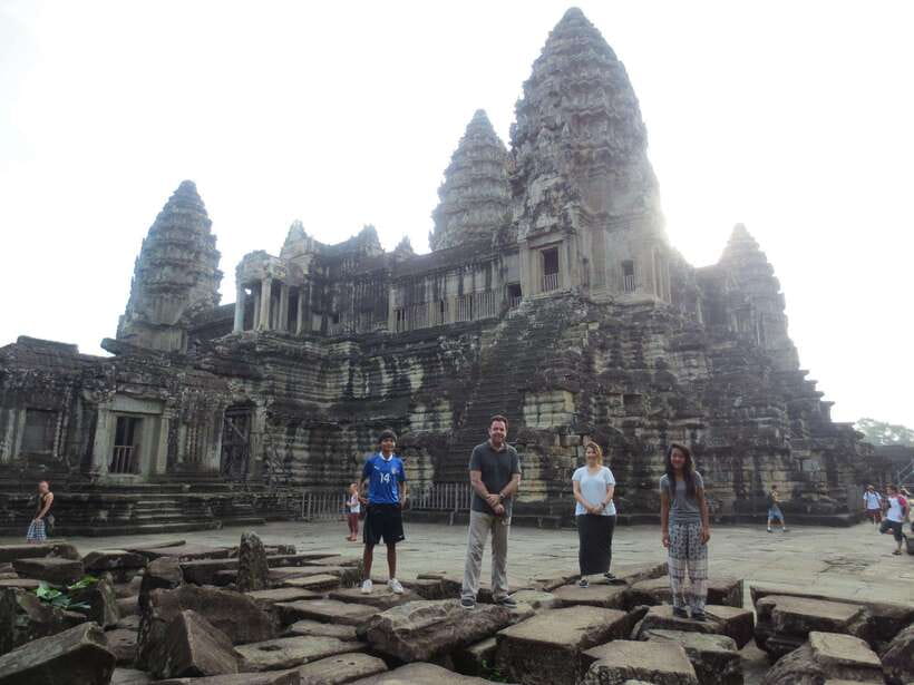 Angkor Wat Sunrise Shared Tours: Bayon-Ta Prohm-Banteay Srei - Bayon Temple Through Angkor Thom: Faces, Photo Stops, and a Real Walk