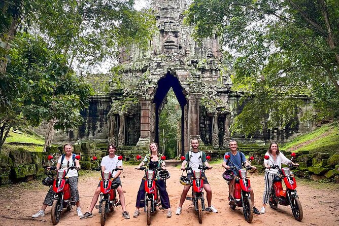 Angkor Wat Sunrise Tour By E-Bike Experience With Breakfast Included - Angkor Thom victory gate and Bayon Temple smiling faces