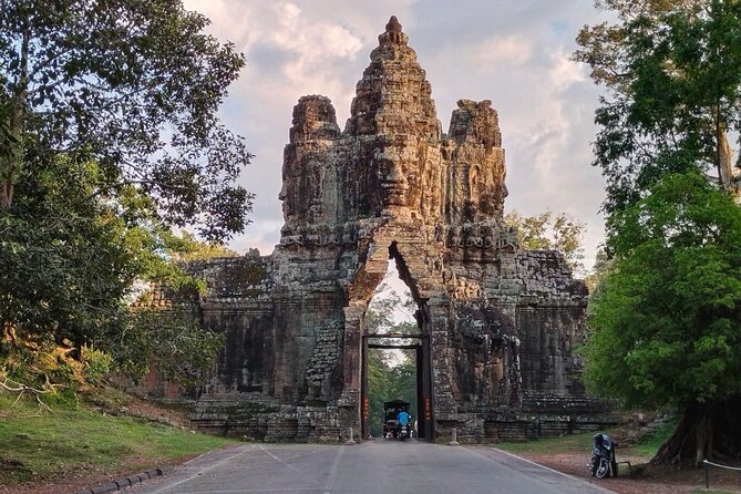Angkor Wat Temples & Kulen Elephant Forest Day Tour - Bayon Temple at the South Gate: 45 minutes of face towers