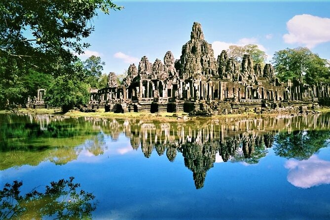 Cambodia Highlight 6 Days Tour from Siem Reap to Phnom Penh - Day 4 Beyond Angkor: Dragon bridge, stone workshops, and Skun’s strange market
