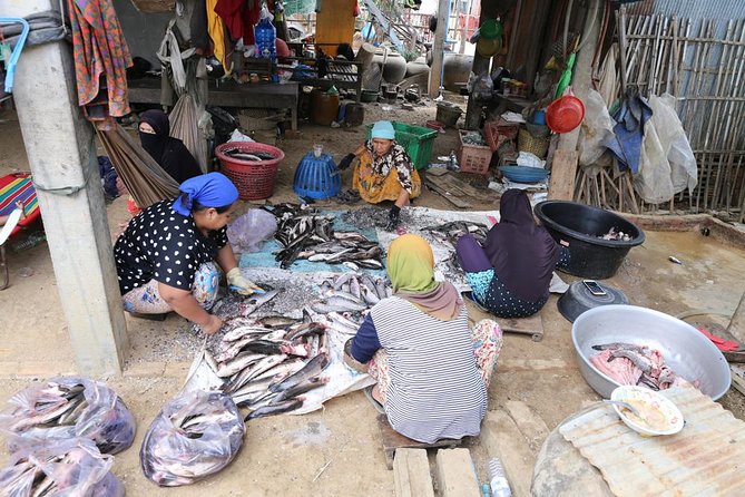 Customs and Culture Half Day Walk and Bike Tour in Battambang - Muslim fishing village life: nets, drying fish, and everyday roles