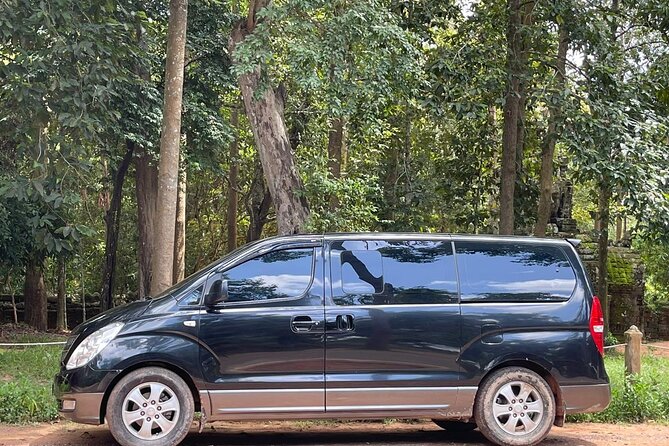Day trip Phnom Penh to Siem Reap & Return back - Angkor Thom and Bayon: The Iconic Faces in About 1 Hour