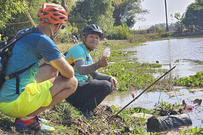 East Corner of Siem Reap - Roluos Group & Countryside - Meeting Seng, getting set up with TREK bikes and helmet fit
