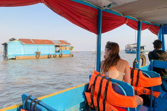 Floating Village Sunset Boat Vespa Tour / Tuk Tuk Available - Tonle Sap sunset from the upper deck, with a cold drink included