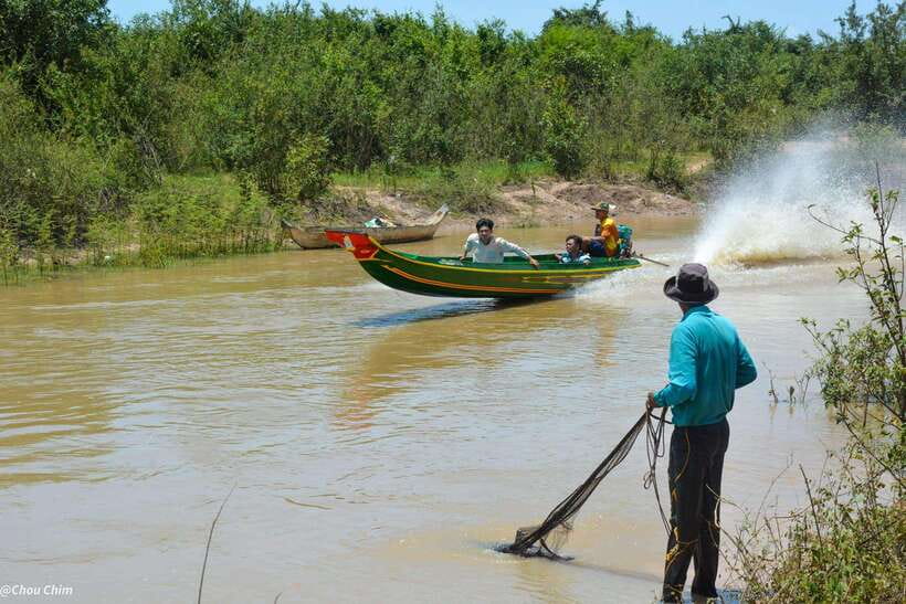 From Siem Reap: Floating Village Tour by Boat - The land stop near the village: pagoda or market time plus a short walk