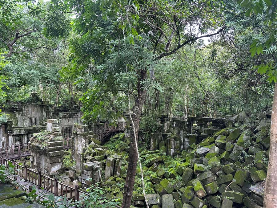 From Siem Reap: Half-Day Tour to Beng Mealea Temple - Entering the Ruins: Wooden Paths, Tumbled Blocks, and Wall Walks