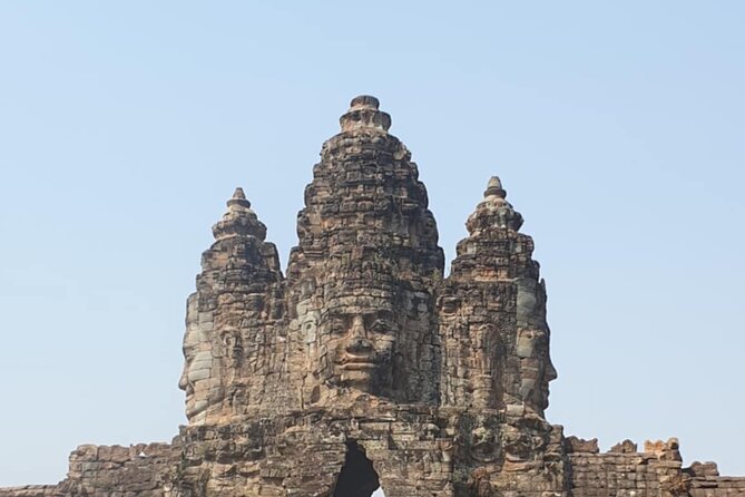 Full Day Angkor Wat Temples Tour with Pickup - Angkor Thom and Bayon’s stone faces