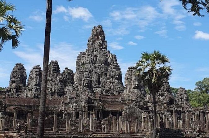 Full Day Angkor Wat Temples Tour with Pickup - Ta Prohm: the famous nature-in-ruins atmosphere