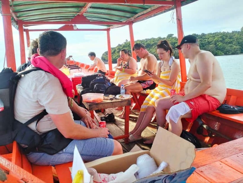 Full Day City Tour with A Boat Trip to 2 Islands - On the boat at Otres: line fishing, snorkeling gear, and cold drinks