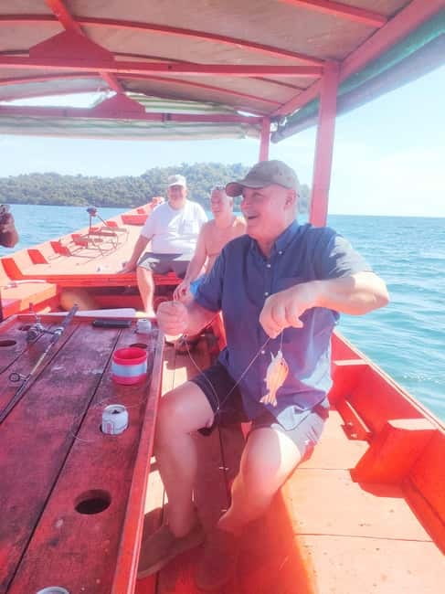 Full Day City Tour with A Boat Trip to 2 Islands - Back in Sihanoukville: Phsar Leu market and Wat Leu Pagoda views
