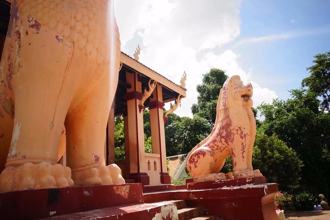 Full-Day Discover Oudong Mountain-Former Capital City & Phnom Penh City Tours - Oudong Temple area, picnic huts, and weekend vibes