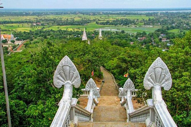 Full-Day Discover Oudong Mountain-Former Capital City & Phnom Penh City Tours - Phnom Udong stairs and views, plus a reality check