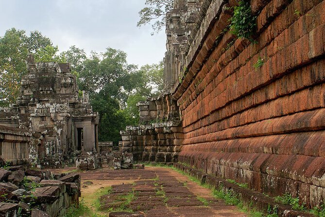 Full Day Small Group Tour Guide with Sun rise - Stop 4: Angkor Thom South Gate (The Carved Faces Walk-In)