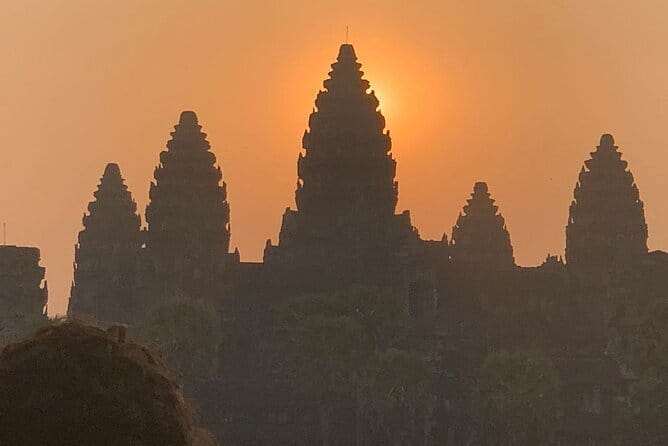 Golden Sunrise at Angkor Wat Private Guided Tour - Angkor Thom via Victory Gate: context for Bayon’s smiling faces