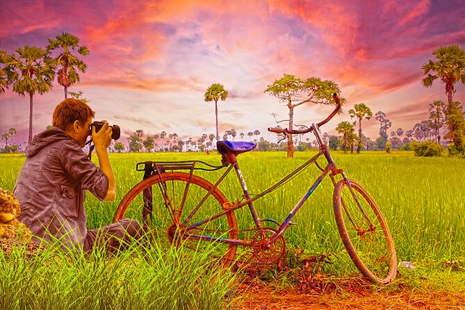 Grand Tour-Ek Phnom. Baset. Bamboo Train. Wat Banan. Phnom Sampov - Biking Battambang the low-impact way, helmet on, pace easy
