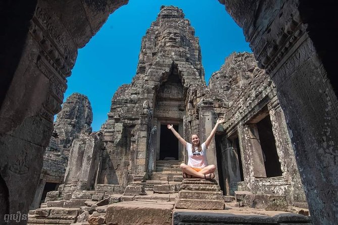 Half Day Angkor Wat Tour - Morning or Afternoon from Siem Reap - Stop 2: South Gate of Angkor Thom, the Smiling Faces, and Instant Drama