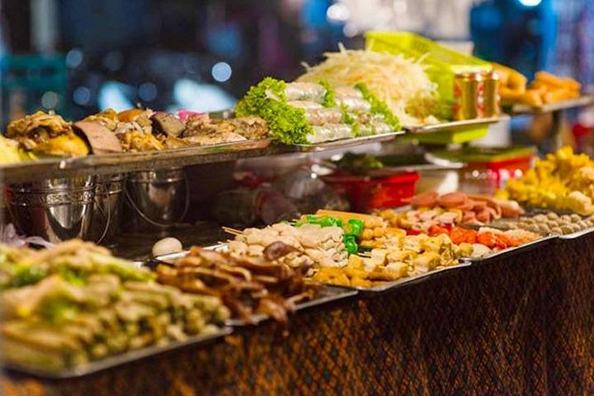 Half Day - Phnom Penh Food Tour - Stop 1: Orussey Market after dark for Khmer desserts and street snacks