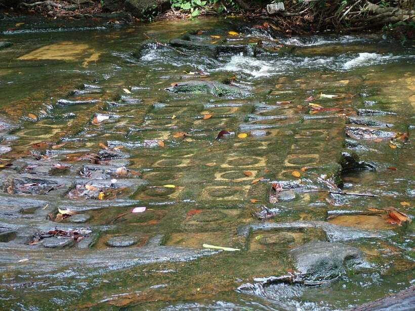 Kulen Mountain: Full-Day Private Waterfall Tour - River of 1000 Lingas: reading carvings on a sacred riverbed
