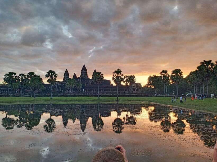 One Day Angkor Wat Trip with Sunrise - Entering Angkor Thom through the South Gate and to Bayon’s faces