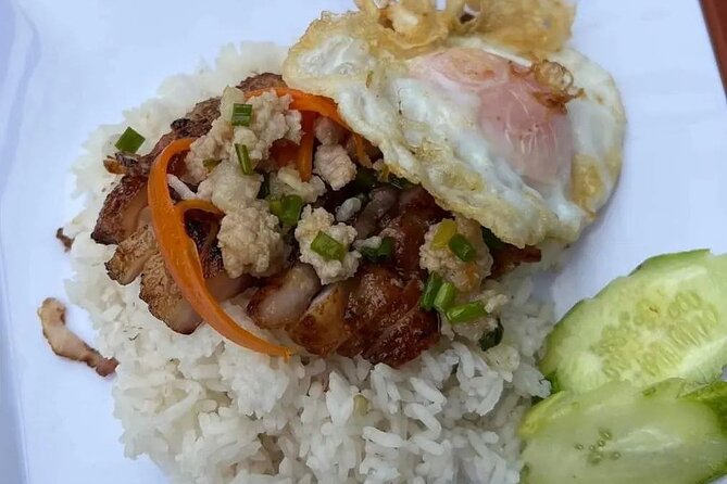 Phnom Penh Local Market & Morning Food Tour Include Drinks - Stop 1 at Wat Botum Park: BI SACH CHROUK (Rice with Pork)