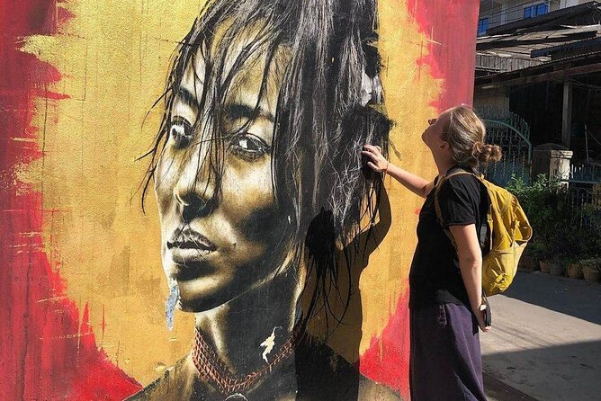 Phnom Penh's Morning Market and Street Art Tour by Tuk tuk - Stop 3: Independence Monument alley street art in 20 minutes
