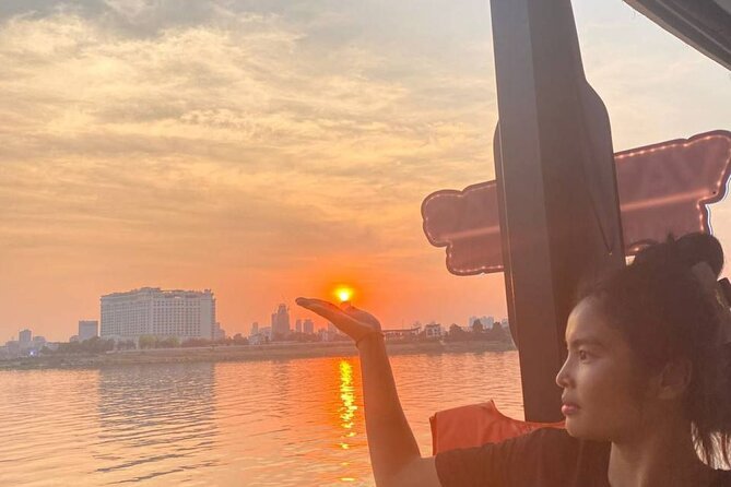 Phnom Penh: Sunset Cruise-Free Beers-Sodas-BBQ Buffet-fruit plate - Getting to Koh Pich Island: hotel pickup, mobile ticket, and timing
