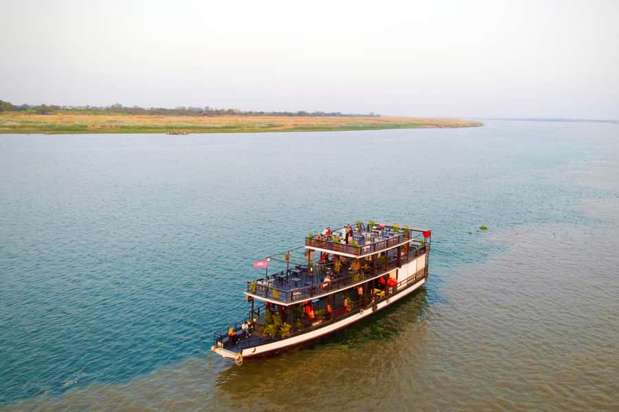 Phnom Penh: Sunset Cruise with Unlimited Beer &Fruit platter - Unlimited beer and soft drinks, plus fruit, what the vibe is really like