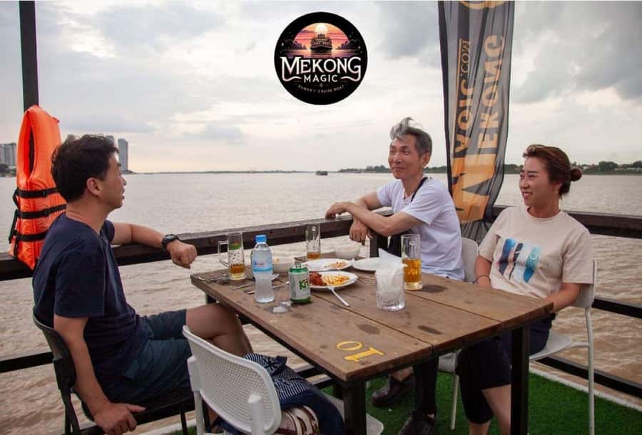 Phnom Penh: Sunset Cruise with Unlimited Beers & BBQ Buffet - Diamond Island Bridge and the Cambodian Flag Photo Moment