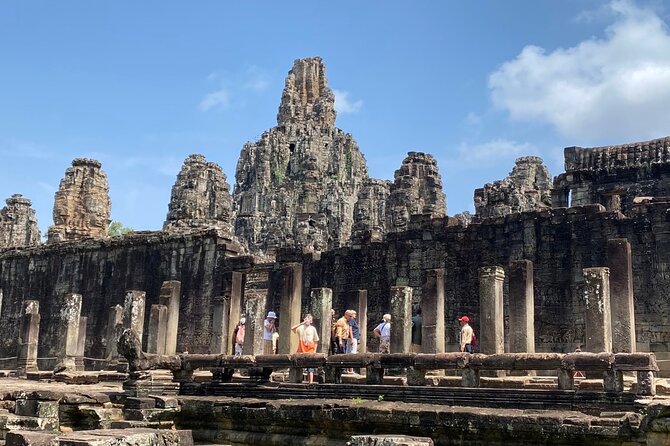 Private Angkor Wat and Lost Temple Jungle Tour - Stop 3: Bayon and its face towers, where the carvings feel personal