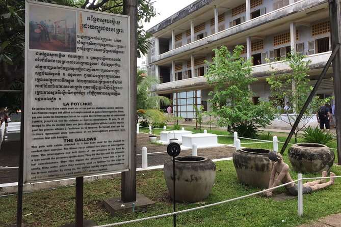 Private Half Day Trip to Genocidal Museum & Killing Field - Memorial stupa at Choeung Ek: the remains of 8,985 people