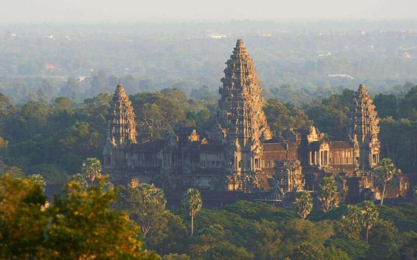 Siem Reap: Angkor Wat Small-Group Full Day Tour and Sunset - Angkor Thom’s fortified city scenes, including the Avalokiteshvara moment