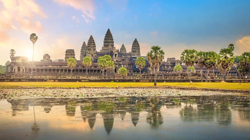 Angkor Wat reflected in its moat at sunrise
