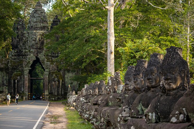 Siem Reap: Angkor Wat Sunrise & Explore Angkor Temples With Guide - Ta Prohm: jungle ruins and that famous tree energy
